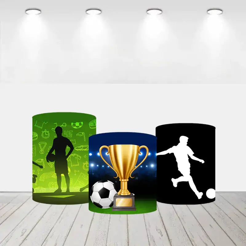 Set of three cylinder covers with soccer designs, including a trophy, a player silhouette, and various soccer icons.