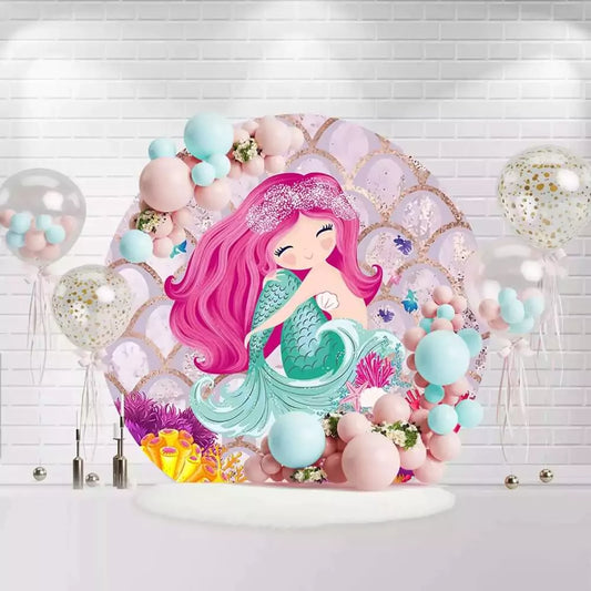 Mermaid round backdrop with pink-haired mermaid, turquoise tail, and coral reef for girls birthday party