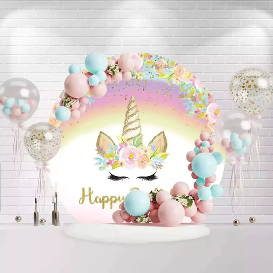 Unicorn with floral crown and rainbow backdrop for a birthday party celebration with "Happy Birthday" text