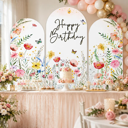 Floral Happy Birthday party set with three arch backdrop covers featuring colorful watercolor wildflowers, butterflies, greenery and elegant black birthday lettering.